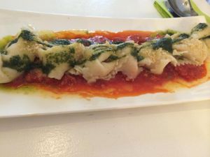 So happy this was not cheesy tasting -- a vegan alternative to a cheese-stuffed/topped pasta with tomato sauce and pesto, using an almond stuffing and nutritional yeast as a topping. I absolutely LOVED this dish :) at The Green Garden in Salzburg