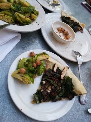 Mushroom pizza and brussel sprouts made vegan at Restaurant 415 in Fort Collins