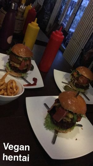 Two fidel castros, one john f kennedy, two bowls of curly fries  at Lily Burger in Berlin