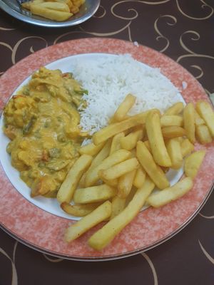 Spicy vegetable korma, chips and boiled rice at Sabor da India in Funchal