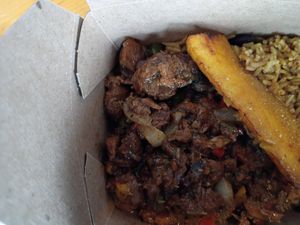 "Steak" tips with rice and black beans at Dominican Garden Cafe in Johnstown