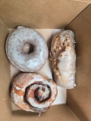 Top left vanilla donut, bottom left cinnamon roll, and right buttermilk bar at Level 5 Donuts in Madison