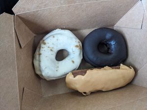 Mulled cider (left), chocolate (right), buttermilk bar (bottom) at Level 5 Donuts in Madison