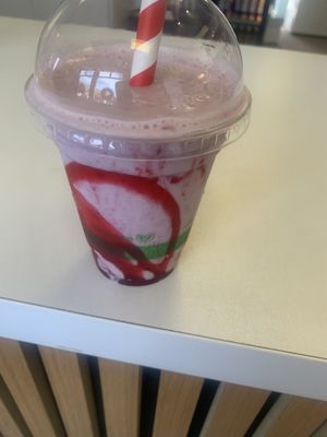 Chocolate & cherry ice cream milkshake with strawberry syrup   at Milk & Honey in Seahouses