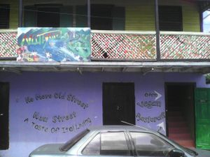 Nattywel Plus Rastarant Entrance. Go up the stairs on the right and it's on the first floor! at Nattywel Plus in Roseau