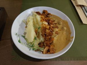 mashed potatoes with mushrooms and cashews at Green Cafe & Shop in Lviv