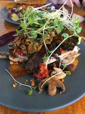 Oyster and enoki mushroom/kale on toasted gluten-free bread.
 at Marie Anita's in Gold Coast