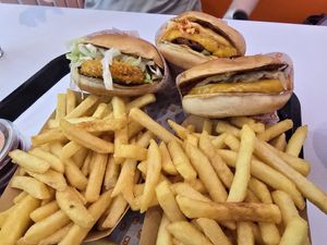 Cheeseburger, chili burger, chicken burger and double fries at BETR Burger  in Hamburg