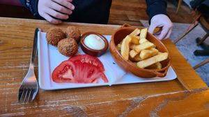 Kids menu with bitterballen, fries and tomato (there were supposed to be cucumber slices, but we think they forgot and we forgot to ask ^_^ ) at Tati in Nijmegen