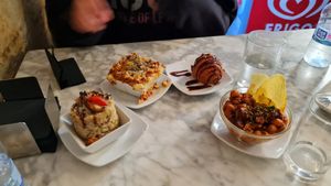 Risotto, boloñesa vegana, croqueta de zanahoria y garbanzos con especias at Cafe Atelier in Salamanca