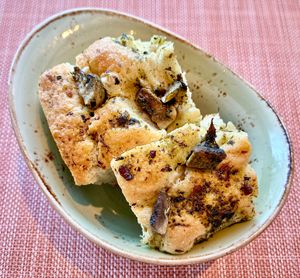 Mushroom and olive focaccia  at Gastro Kitchen in Dubai