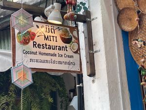 Sign in front at Miti Restaurant - ຮ້ານອາຫານ ມິຕິ in Luang Prabang