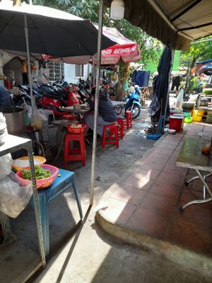 Dining area at the back on land at Quan Chay A Di Da Phat in Ho Chi Minh City