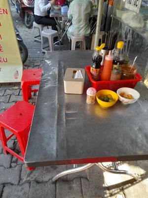 One table at the front of the cart at Quan Chay A Di Da Phat in Ho Chi Minh City