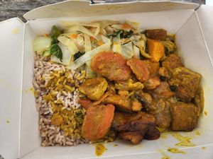 Curry Tofu with vegetables and rice at Pat's Yard Vibes in Gardiner