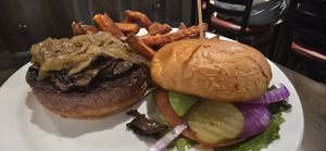 Vegan Blue Collar with Beyound Burger (R) substituted for meat and avocado substituted for Blue Cheese, sweet potato fries at The Office Bar and Grill in Cheyenne