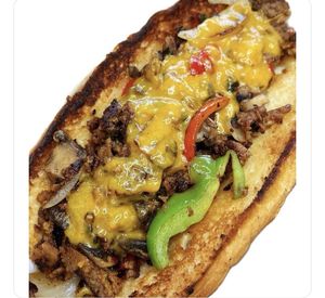 Pea protein vegan cheese sauté peppers , special sauce at Nature Heals Vegan Cafe in Boynton Beach