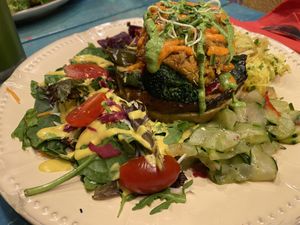 Stuffed squash and chickpea burger vegan dish at House of Wonders in Cascais