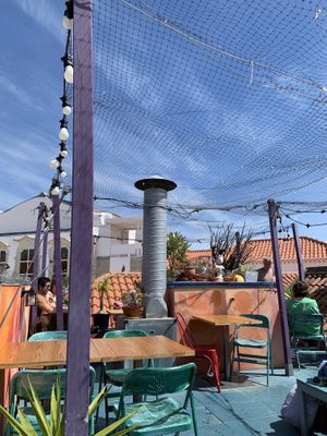 Rooftop seating area   at House of Wonders in Cascais