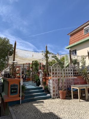 Garden seating area  at House of Wonders in Cascais
