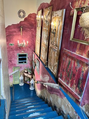 Stairs to rooftop seating   at House of Wonders in Cascais