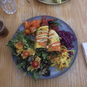 Black beans burrito with salad  at House of Wonders in Cascais