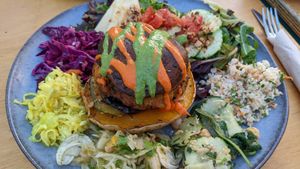 Burger with salad at House of Wonders in Cascais