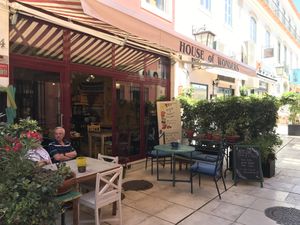Outdoor seating area by the cafe section  at House of Wonders in Cascais