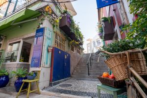 Our stairwell  not only adds a touch of contemporary elegance but also exudes a warm and inviting ambiance, making it a welcoming transition between the two buildings. at House of Wonders in Cascais