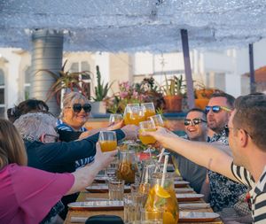 A toast at our Rooftop. at House of Wonders in Cascais