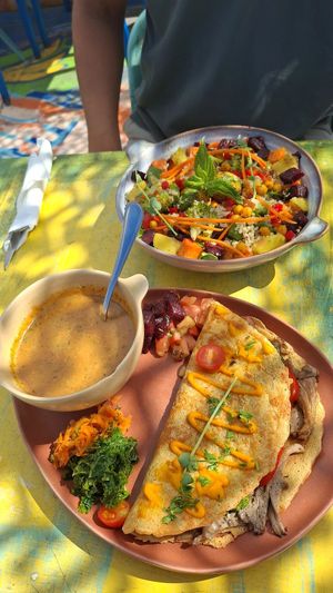 Vegan "pamcake" with veggies and gazpacho. Salad with 2 falafel balls and veggies at House of Wonders in Cascais