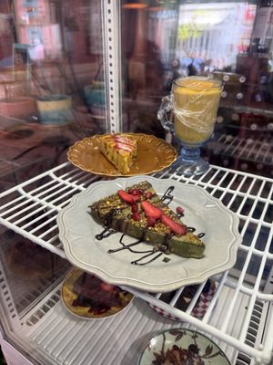 Mango cheesecake in the back  at House of Wonders in Cascais