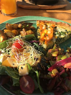 quiche with salad and vegetables at House of Wonders in Cascais