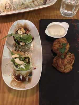 Zucchini Roll on left and Falafel on right  at House of Wonders in Cascais