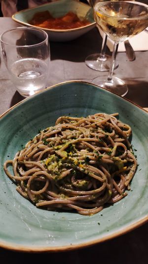Spaghetti grano saraceno con pesto basilico e agrumi at La Posteria Ristorante Pizzeria in Viareggio