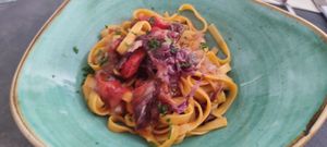 Tagliatelle di mais radicchio e pinoli at La Posteria Ristorante Pizzeria in Viareggio