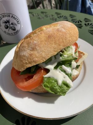 Sandwich with salad, cucumber, tomato, aioli, roast biif and potato bread   at Vegalicious Pastry in Helsinki