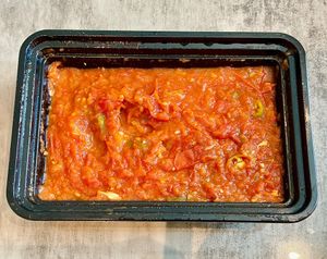 Sautéed tomatoes with garlic and chilli at Falafel Al Rabiah Al Khadhra - Al Taawun  in Sharjah