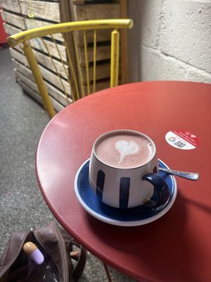 Red velvet latte with soy milk. I did not check that the syrup was 100% vegan. It was delicious, quite sweet    at The Coffee House  in London