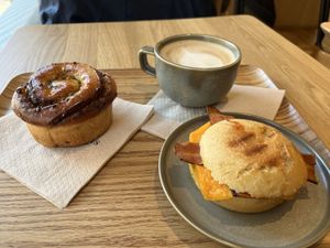 Pistachio babke, bacon cheddar muffin, latte  at Land & Monkeys - Grands Boulevards in Paris