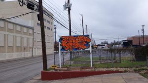 roadside sign at Sweet Yams Organic Takeout in San Antonio