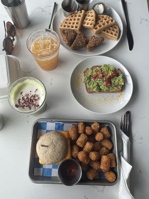 Breakfast Sando, chicken and waffles, avo toast, cherry pie matcha, mango dream drink   at FiKA in Grand Rapids