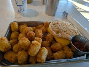 Griddy sandwich w/tots at FiKA in Grand Rapids