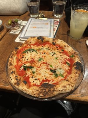 Fantastic Margherita pizza with soy cheese + chilli oil  for the table   at Pizzeria Del Capitano in Sapporo