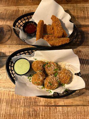 Vegan chicken fingers and risotto balls. Both very delicious   at Vegan Pizza Bar  in Utrecht