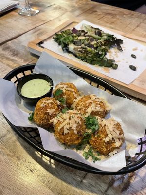 Truffle arancini and (behind) Pump up the Gem  at Vegan Pizza Bar  in Utrecht