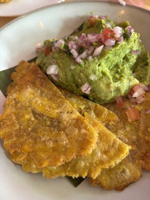 Guacamole with a fried bread containing plantains  at Pura Vida Restaurant in Toronto