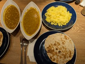 Chole and dal tarka curries with turmeric rice and 2 rotis, delicious!! at Spice Kingdom Namba CITY in Osaka