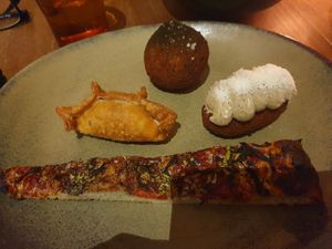 Coca Bread $8.00 for two pieces, Empanada $8.00, Coxinha $8.00, Potato Croquette $10.00 at Smith & Daughters in Collingwood