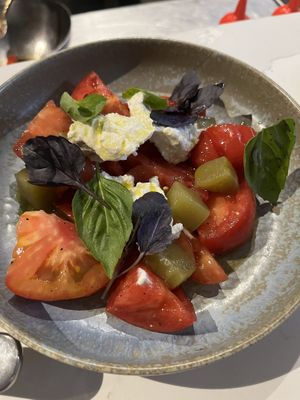 Simple tomato salad using locally sourced stuff, topped with house ricotta.  at Smith & Daughters in Collingwood